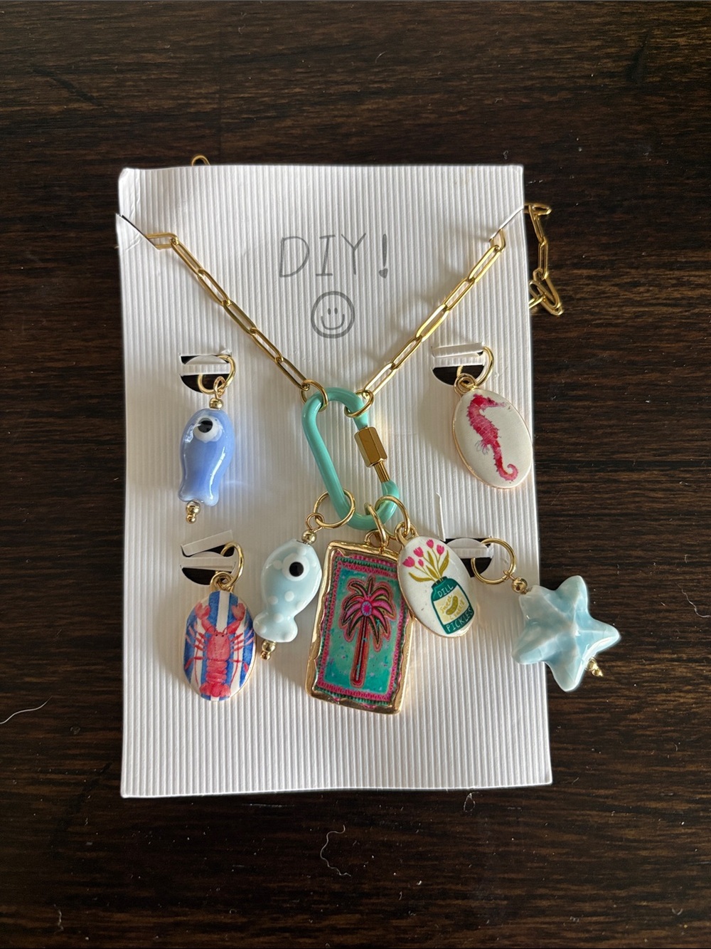 NWT Gold-Plated Charm Necklace with Turquoise and Pastel Charms
